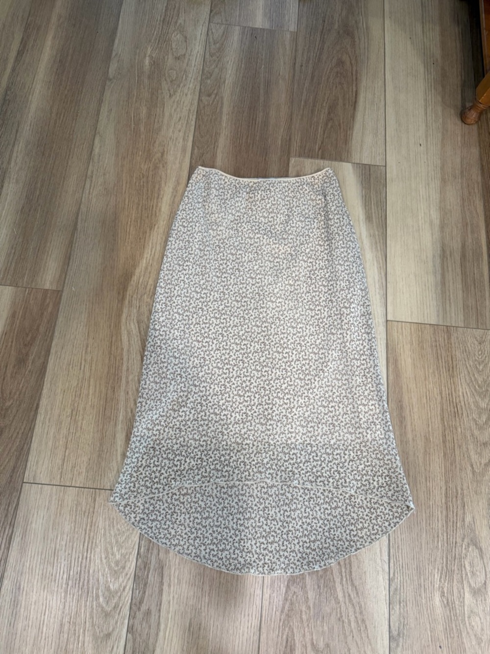 Neutral Cream High-Low Midi Skirt with Subtle Gray Print